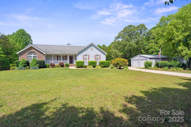 260 Treebark Rd, Statesville, NC 28625 - ranch-style house with a porch, a detached garage, a front lawn, and an outbuilding