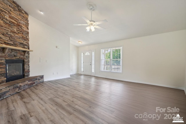 260 Treebark Rd, Statesville, NC 28625 - unfurnished living room with wood finished floors, a ceiling fan, baseboards, and vaulted ceiling