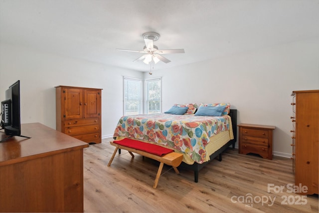 260 Treebark Rd, Statesville, NC 28625 - bedroom with light wood-style flooring, a ceiling fan, and baseboards