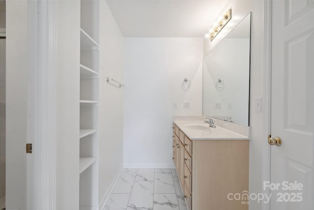 260 Treebark Rd, Statesville, NC 28625 - bathroom with baseboards, marble look tiles, and vanity