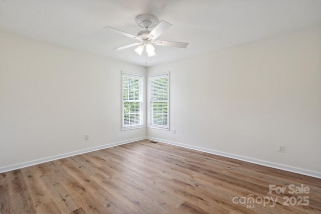 260 Treebark Rd, Statesville, NC 28625 - spare room featuring wood finished floors, baseboards, and ceiling fan