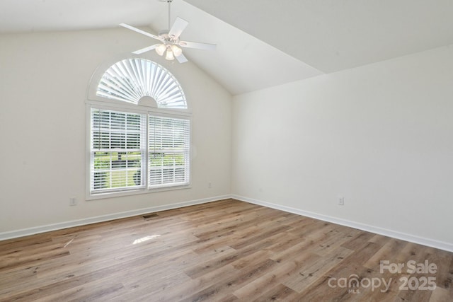 260 Treebark Rd, Statesville, NC 28625 - spare room with vaulted ceiling, a ceiling fan, wood finished floors, and baseboards