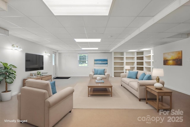 260 Treebark Rd, Statesville, NC 28625 - living area with baseboards, carpet floors, a drop ceiling, and built in shelves