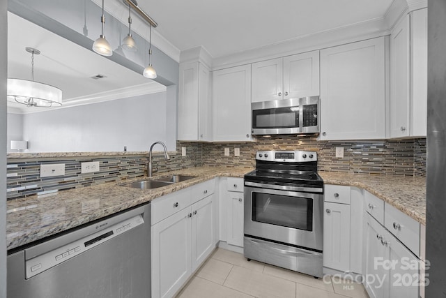 3736 Melrose Cottage Dr, Matthews, NC 28105 - kitchen with crown molding, light tile patterned flooring, a sink, stainless steel appliances, and white cabinetry