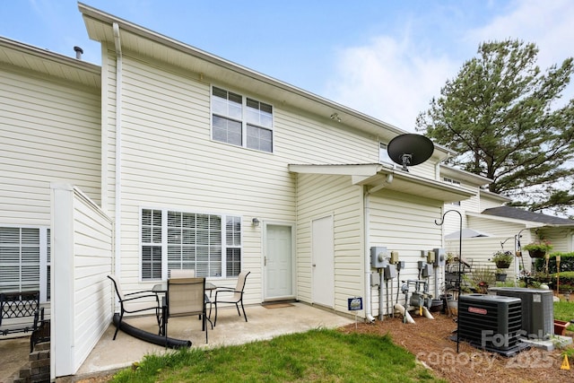 3736 Melrose Cottage Dr, Matthews, NC 28105 - back of house featuring central AC unit and a patio