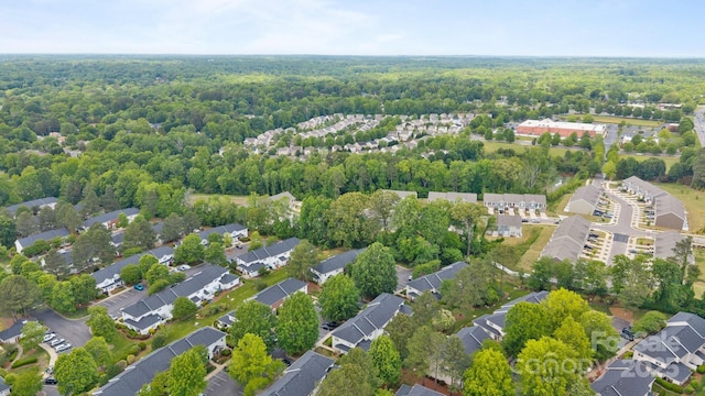 3736 Melrose Cottage Dr, Matthews, NC 28105 - drone / aerial view featuring a forest view