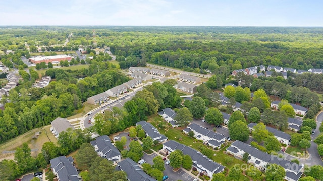 3736 Melrose Cottage Dr, Matthews, NC 28105 - drone / aerial view with a residential view and a wooded view