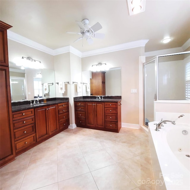 bathroom featuring a shower stall, a whirlpool tub, ceiling fan, crown molding, and two vanities
