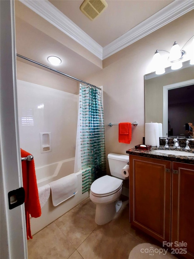 bathroom with tile patterned flooring, ornamental molding, toilet, vanity, and visible vents