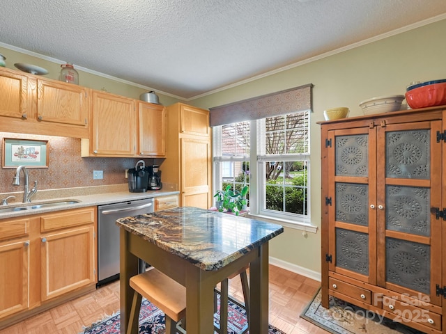 kitchen featuring a sink, light brown cabinets, ornamental molding, stainless steel dishwasher, and a textured ceiling