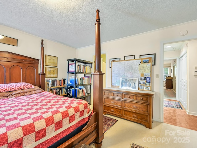 bedroom featuring a textured ceiling