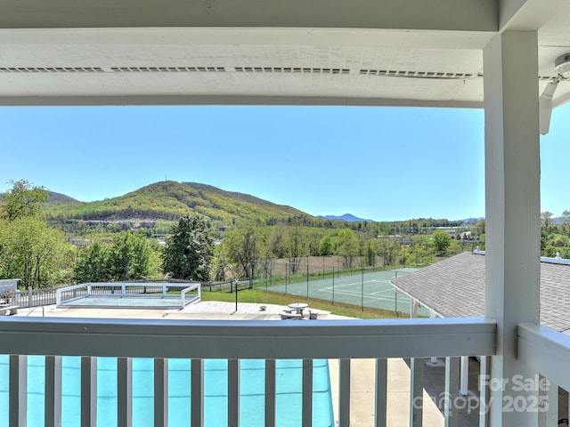 balcony featuring a mountain view