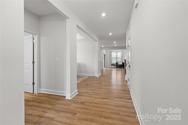 1287 Fishing Creek Rd, Lake Wylie, SC 29710 - hall with light wood-style flooring, recessed lighting, and baseboards