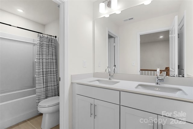 1287 Fishing Creek Rd, Lake Wylie, SC 29710 - bathroom with double vanity, toilet, tile patterned flooring, shower / bathtub combination with curtain, and recessed lighting