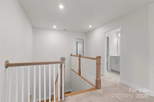 1287 Fishing Creek Rd, Lake Wylie, SC 29710 - corridor with an upstairs landing, recessed lighting, light carpet, and baseboards