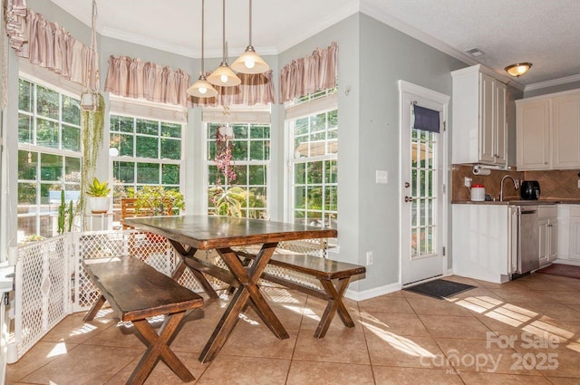 sunroom / solarium with french doors and a sink