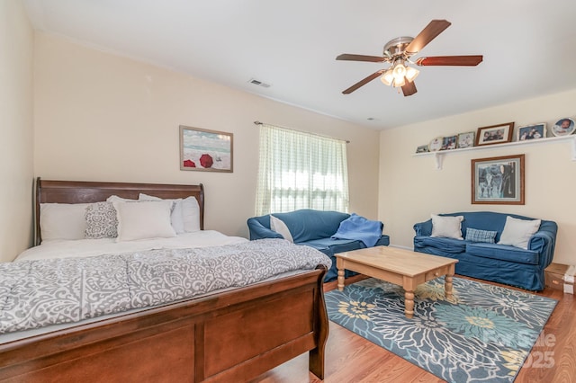 814 Independence Dr, Wingate, NC 28174 - bedroom featuring visible vents, a ceiling fan, and wood finished floors