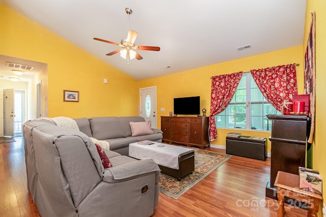 814 Independence Dr, Wingate, NC 28174 - living area featuring ceiling fan, vaulted ceiling, wood finished floors, and visible vents