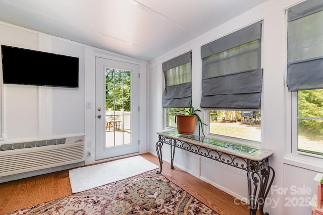 814 Independence Dr, Wingate, NC 28174 - entryway with wood finished floors, a wall mounted AC, and lofted ceiling