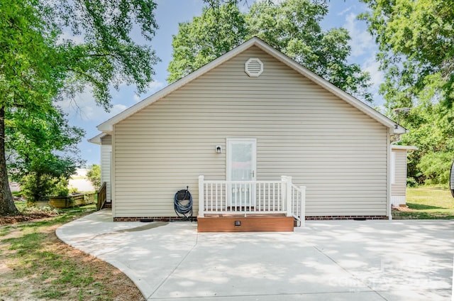 814 Independence Dr, Wingate, NC 28174 - back of house with a patio and crawl space