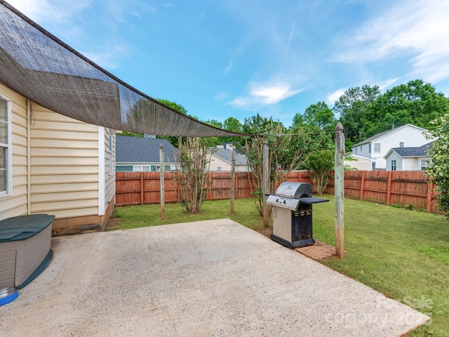 view of patio with a grill