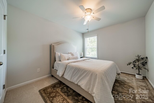 804 Lyndon Station Dr, Pineville, NC 28134 - bedroom with baseboards, ceiling fan, visible vents, and light colored carpet