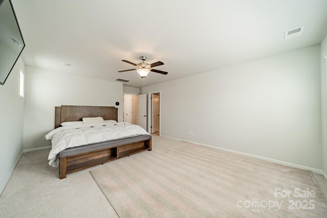 804 Lyndon Station Dr, Pineville, NC 28134 - bedroom featuring baseboards, ceiling fan, light colored carpet, and visible vents