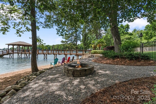 17112 Green Dolphin Ln, Cornelius, NC 28031 - surrounding community with a fire pit, fence, and a gazebo