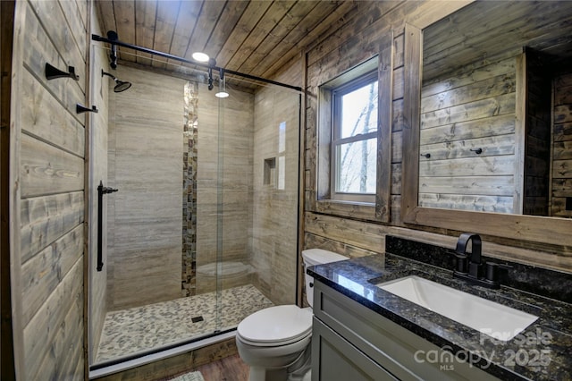 full bath with vanity, a stall shower, toilet, and wooden ceiling