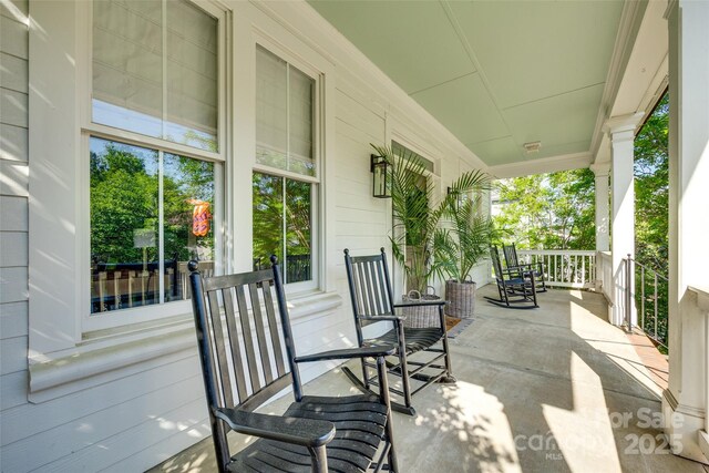 view of patio featuring a porch
