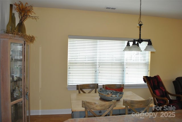93 Foxden Dr Unit 101, Fletcher, NC 28732 - dining area with plenty of natural light, wood finished floors, and baseboards