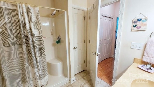 93 Foxden Dr Unit 101, Fletcher, NC 28732 - full bath with a stall shower, tile patterned floors, and vanity