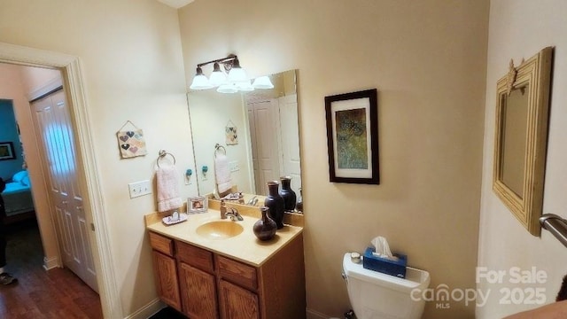 93 Foxden Dr Unit 101, Fletcher, NC 28732 - bathroom with vanity, toilet, and wood finished floors