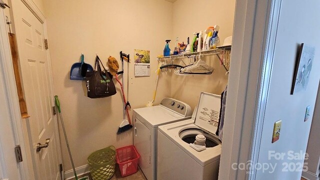 93 Foxden Dr Unit 101, Fletcher, NC 28732 - laundry room featuring washing machine and dryer and baseboards