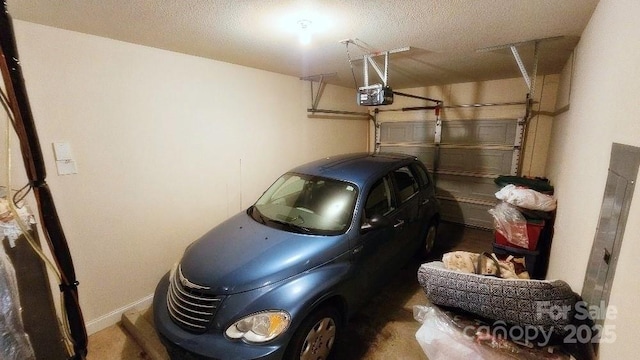 93 Foxden Dr Unit 101, Fletcher, NC 28732 - garage featuring a garage door opener