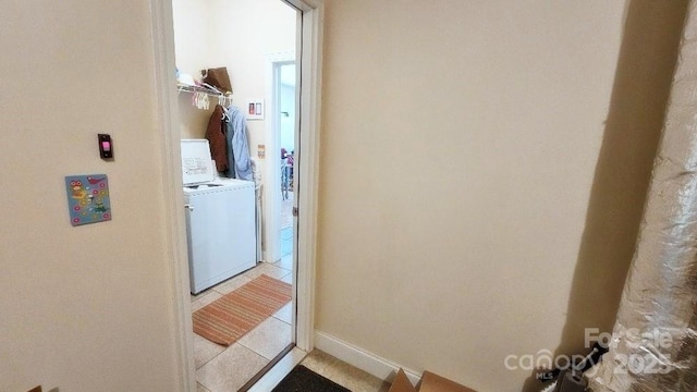 93 Foxden Dr Unit 101, Fletcher, NC 28732 - corridor with washer / clothes dryer and light tile patterned floors
