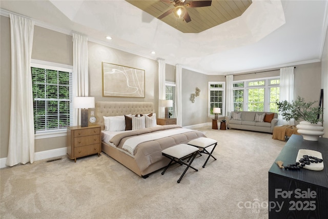 carpeted bedroom featuring crown molding, visible vents, ceiling fan, baseboards, and recessed lighting