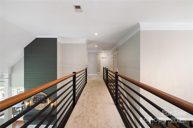 hallway with recessed lighting, an upstairs landing, baseboards, visible vents, and crown molding