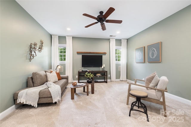 carpeted living room with recessed lighting, a ceiling fan, visible vents, and plenty of natural light