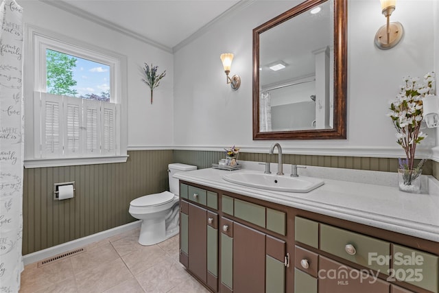bathroom featuring toilet, tile patterned floors, visible vents, vanity, and ornamental molding