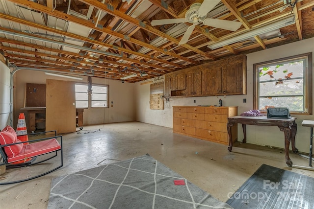 basement featuring ceiling fan