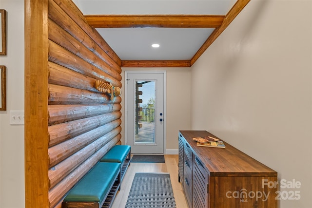 doorway with recessed lighting, rustic walls, and light wood-type flooring