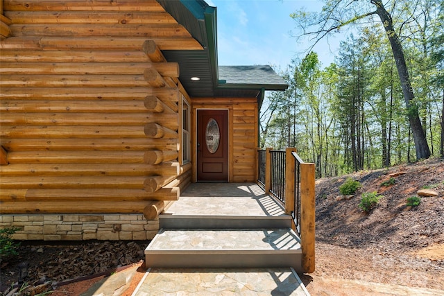 153 Chetan Way, Lake Lure, NC 28746 - doorway to property featuring roof with shingles and log siding