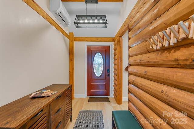 153 Chetan Way, Lake Lure, NC 28746 - entryway with log walls, baseboards, an AC wall unit, and light wood-style flooring