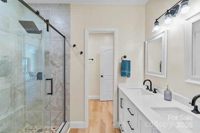 153 Chetan Way, Lake Lure, NC 28746 - bathroom featuring a sink, wood finished floors, and a shower stall