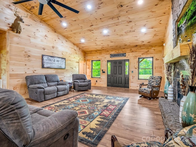 782 County Line Rd S, Rutherfordton, NC 28139 - living room with wooden walls, a ceiling fan, wooden ceiling, and a healthy amount of sunlight