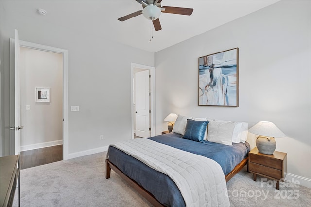 bedroom featuring baseboards, a ceiling fan, and carpet floors