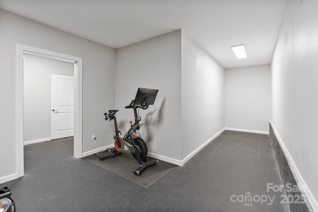 exercise room with baseboards