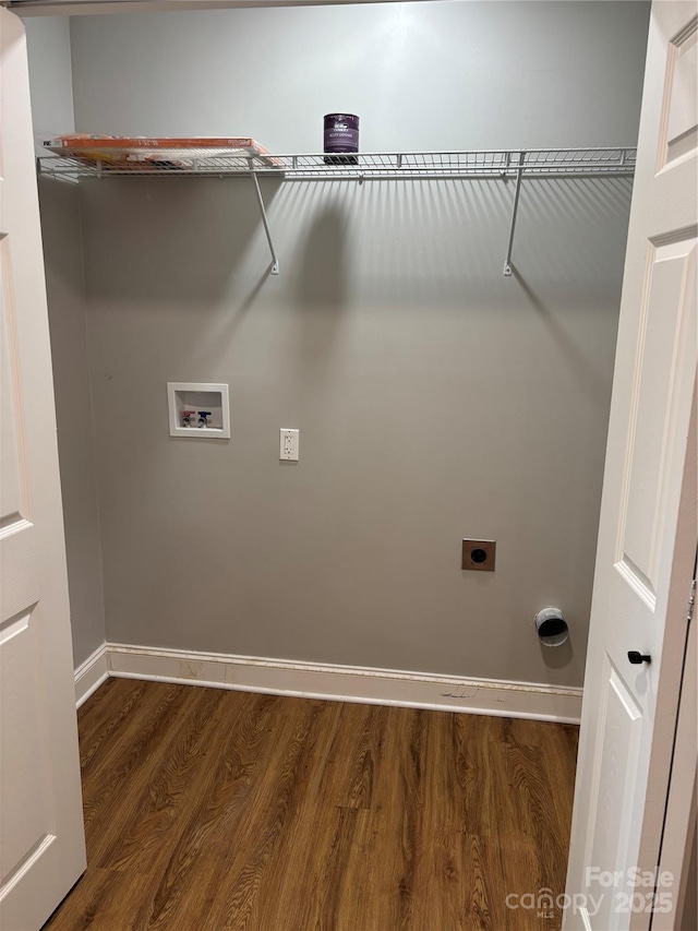 laundry area featuring baseboards, hookup for a washing machine, laundry area, electric dryer hookup, and dark wood-style floors