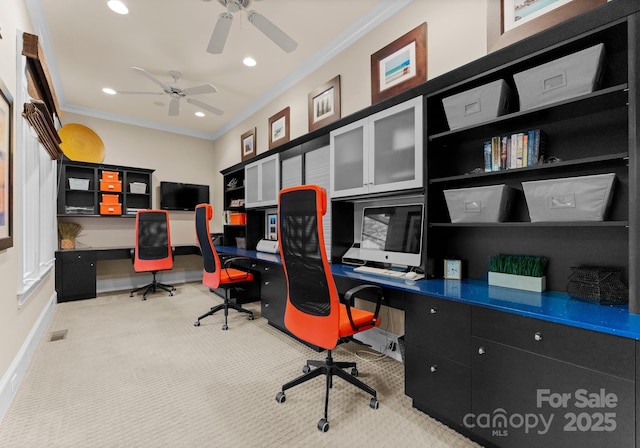 2915 Cutter Ct, Waxhaw, NC 28173 - carpeted home office with built in desk, ornamental molding, a ceiling fan, recessed lighting, and baseboards